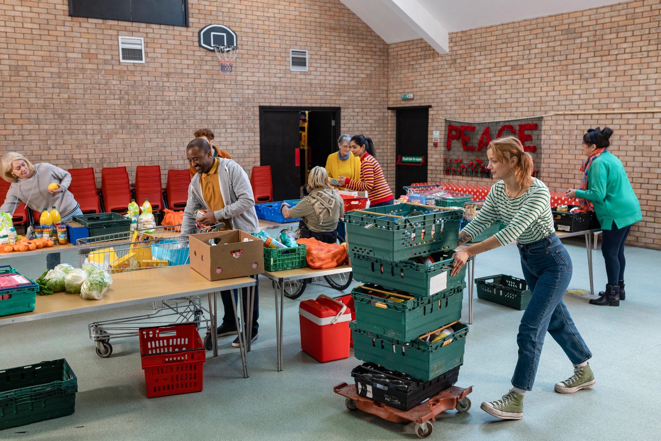 Group of volunteers organizing food donations at a food bank